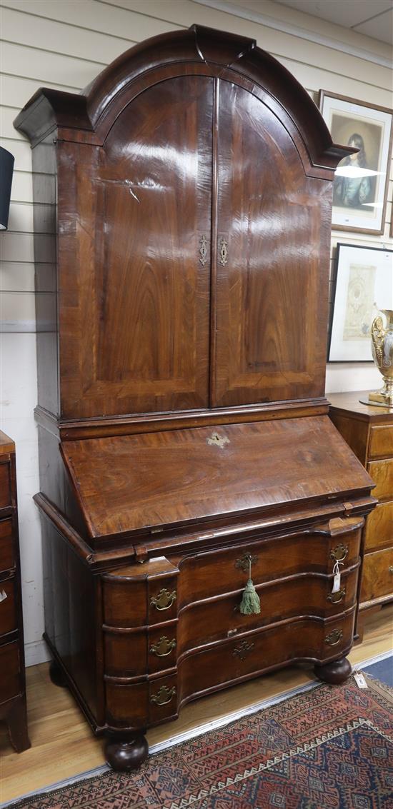 An 18th century German walnut bureau cabinet W.109cm